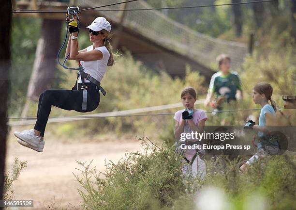 Julio Iglesias' wife Miranda Rinsjburger and her daughters Victoria Iglesias and Crstina Iglesias are seen playing with tirolina on June 5, 2012 in...