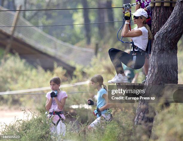 Julio Iglesias' wife Miranda Rinsjburger and her daughters Victoria Iglesias and Crstina Iglesias are seen playing with tirolina on June 5, 2012 in...