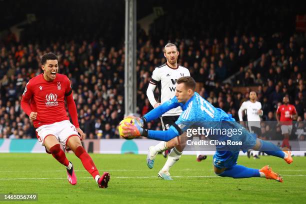 Brennan Johnson of Nottingham Forest reacts as their shot is saved by Bernd Leno of Fulham during the Premier League match between Fulham FC and...