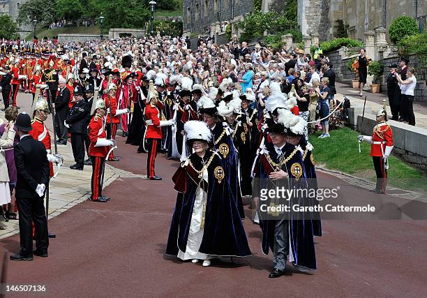 Mary Soames, Baroness Soames and Sir John Major lead the procession of the annual Order of the Garter Service at St George's Chapel, Windsor Castle...