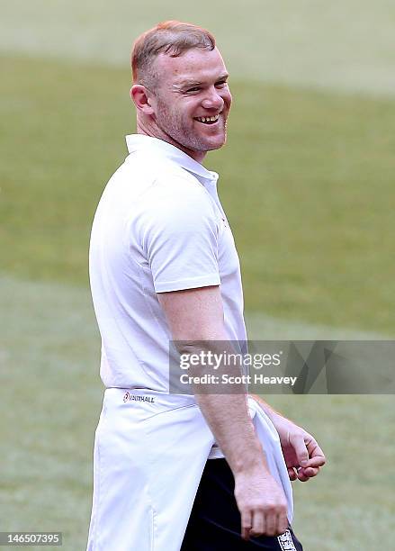 Wayne Rooney of England inspects the pitch during a UEFA EURO 2012 training session at the Donbass Arena on June 18, 2012 in Donetsk, Ukraine.