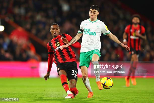 Jaidon Anthony of AFC Bournemouth battles for possession with Miguel Almiron of Newcastle United during the Premier League match between AFC...