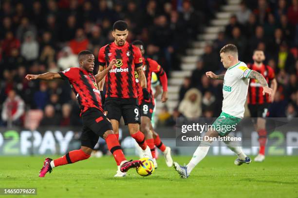 Hamed Junior Traore of AFC Bournemouth is challenged by Kieran Trippier of Newcastle United during the Premier League match between AFC Bournemouth...