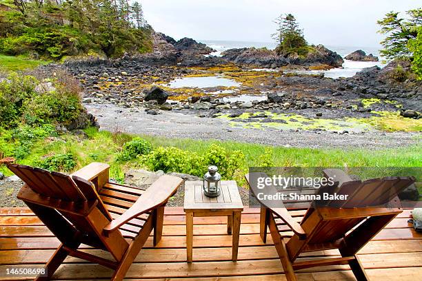 patio chairs and view of inlet - terrace british columbia stock pictures, royalty-free photos & images