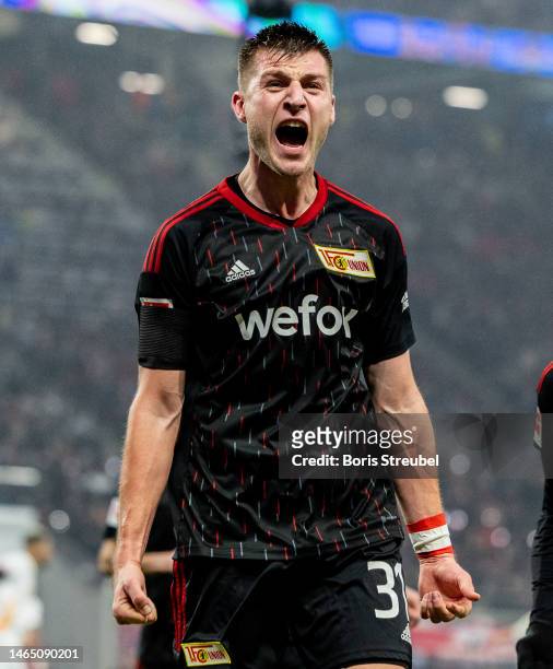 Robin Knoche of 1.FC Union Berlin celebrates after scoring his team's second goal during the Bundesliga match between RB Leipzig and 1. FC Union...