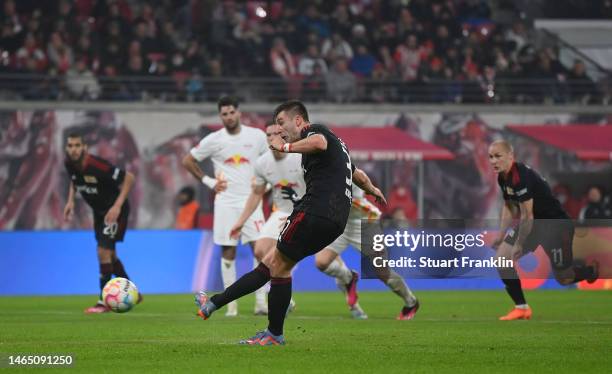 Robin Knoche of 1.FC Union Berlin scores their sides second goal from the penalty spot during the Bundesliga match between RB Leipzig and 1. FC Union...