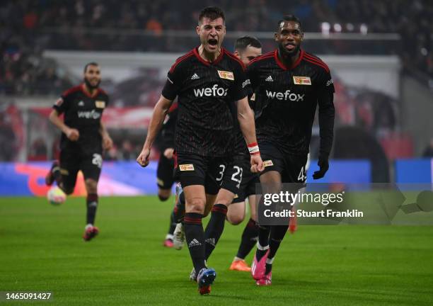Robin Knoche of 1.FC Union Berlin celebrates after scoring their sides second goal from the penalty spot during the Bundesliga match between RB...