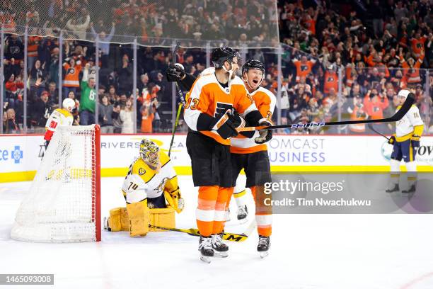 Kevin Hayes and Patrick Brown of the Philadelphia Flyers celebrate a goal by Hayes during the second period against the Nashville Predators at Wells...