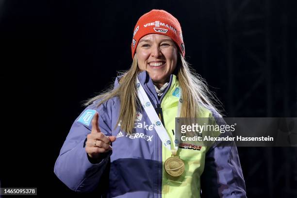 Gold medalist Denise Herrmann-Wick of Germany celebrates during the medal ceremony for the Women 7.5 km Sprint at the IBU World Championships...