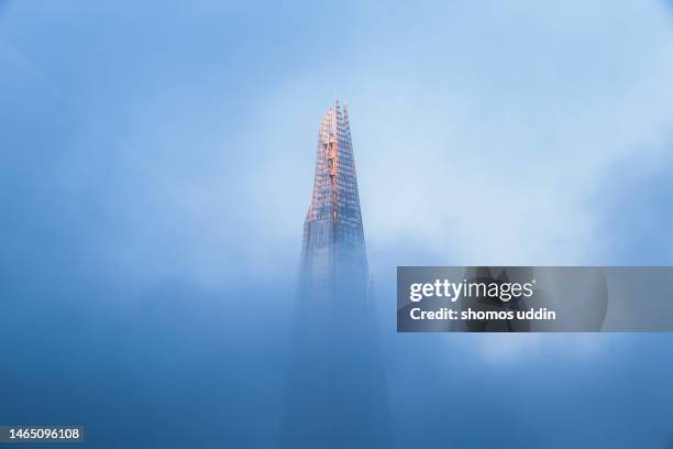 london city skyscraper in dense fog - views of london from the shard tower stock-fotos und bilder