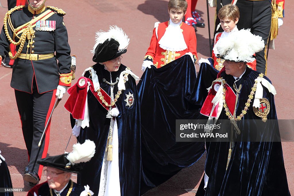 Queen Elizabeth II and Members Of The Royal Family Attend The Order Of The Garter Service