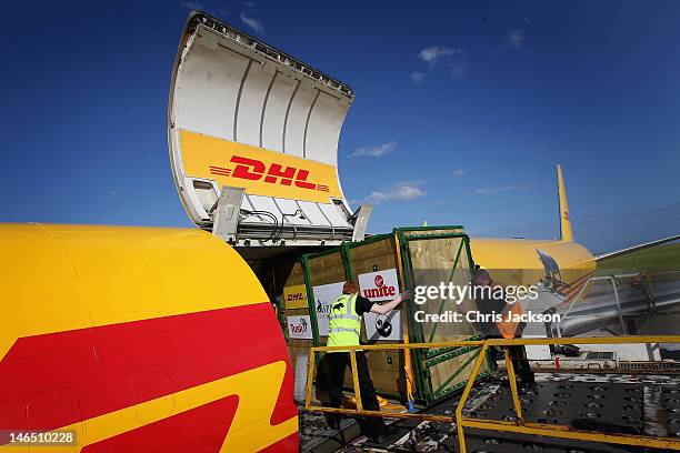 Rhino crates are loaded onto a specially enlisted DHL Boeing 757 ahead of leaving to be translocated to Tanzania at Manston airport on June 16, 2012...