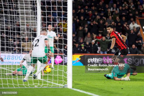 Kieran Trippier of Newcastle United clears Dominic Solanke of Bournemouth goal bound back flick off the line during the Premier League match between...