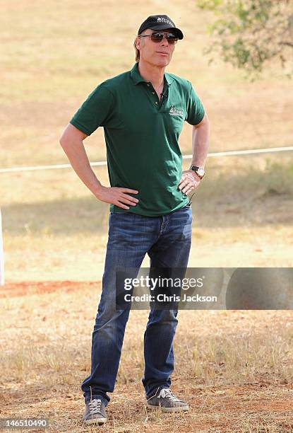 Damien Aspinall looks on during a tense moment as rhinos are released from their crate to a holding 'Boma' after their translocation from England to...