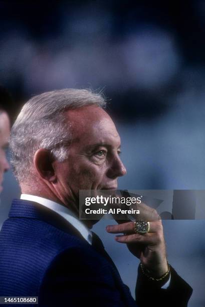 Team Owner Jerry Jones of the Dallas Cowboys shows off his Superbowl ring when he follows the action in the game between the Dallas Cowboys vs the...