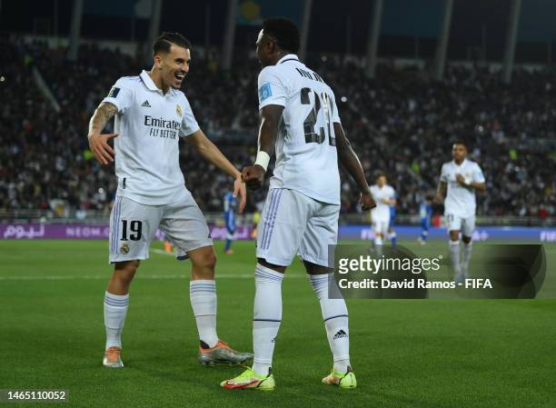 Vinicius Junior of Real Madrid celebrates with team mate Dani Ceballos after scoring their sides fifth goal during the FIFA Club World Cup Morocco...