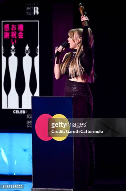 Becky Hill accepts the award for British Dance Act on stage during The BRIT Awards 2023 at The O2 Arena on February 11, 2023 in London, England.