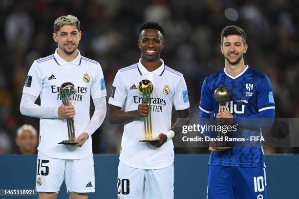 Federico Valverde of Real Madrid poses with the FIFA Club World Cup Morocco 2022 Adidas Silver Ball Award, Vinicius Junior of Real Madrid poses with...