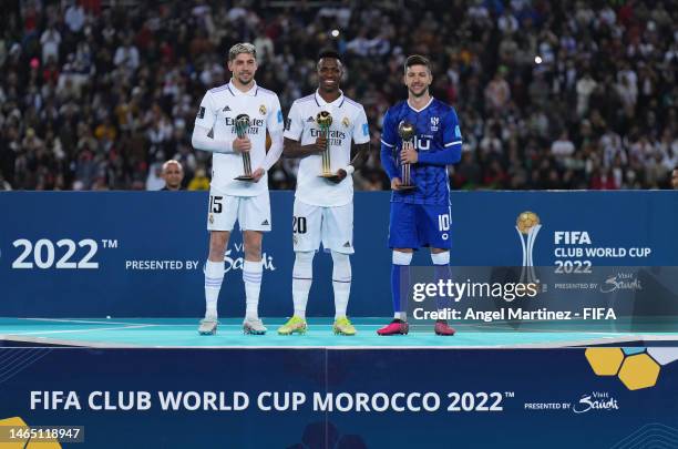 Federico Valverde of Real Madrid poses with the FIFA Club World Cup Morocco 2022 Adidas Silver Ball Award, Vinicius Junior of Real Madrid poses with...