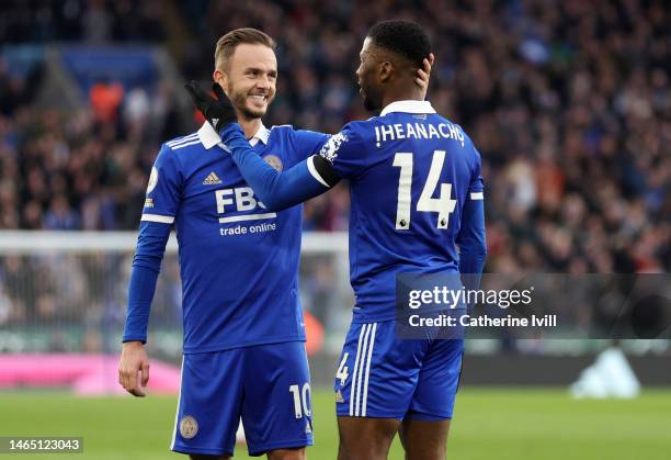 Kelechi Iheanacho of Leicester City celebrates with teammate James Maddison after scoring the team's third goal during the Premier League match...