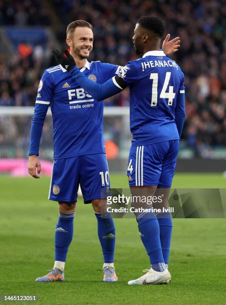 Kelechi Iheanacho of Leicester City celebrates with teammate James Maddison after scoring the team's third goal during the Premier League match...
