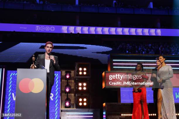 Carlos O'Connell accepts the award for International Group of the Year on behalf of Fontaines D.C on stage during The BRIT Awards 2023 at The O2...