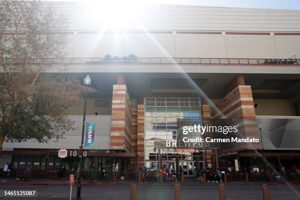 Fans walk around downtown Phoenix, outside of the fan experience, ahead of Super Bowl LVII on February 11, 2023 in Phoenix, Arizona.