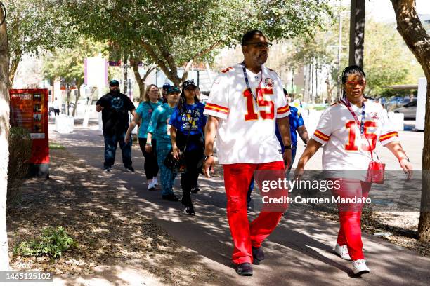 Fans walk around downtown Phoenix, outside of the fan experience, ahead of Super Bowl LVII on February 11, 2023 in Phoenix, Arizona.