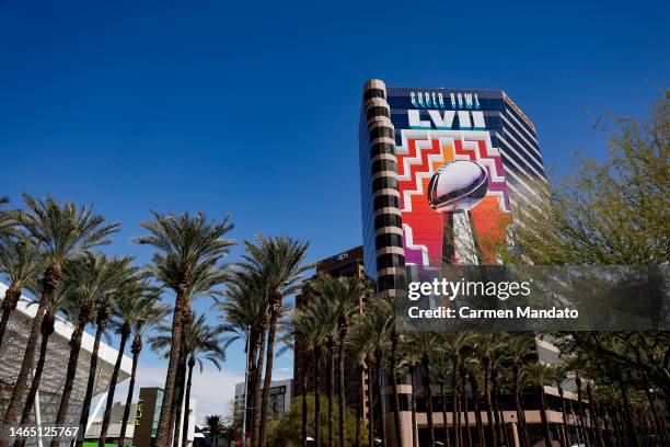 Fans walk around downtown Phoenix, outside of the fan experience, ahead of Super Bowl LVII on February 11, 2023 in Phoenix, Arizona.