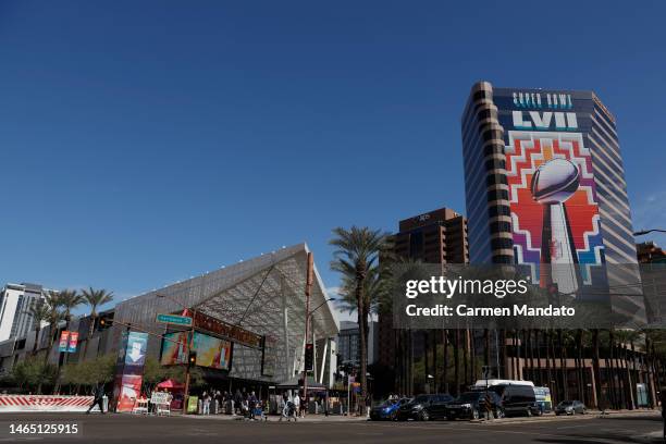 Fans walk around downtown Phoenix, outside of the fan experience, ahead of Super Bowl LVII on February 11, 2023 in Phoenix, Arizona.