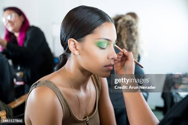Model in makeup backstage during New York Fashion Week Powered by Art Hearts Fashion at The Angel Orensanz Foundation on February 10, 2023 in New...