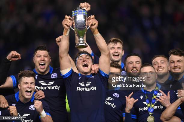 Scotland captain Jamie Ritchie holds aloft the Doddie Weir Trophy after their 35-7 victory over Wales after the Six Nations Rugby match between...