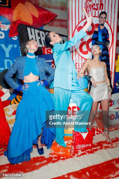 Coco Rocha poses among the models during the alice + olivia by Stacey Bendet Fall 2023 Presentation at Highline Stages on February 11, 2023 in New...