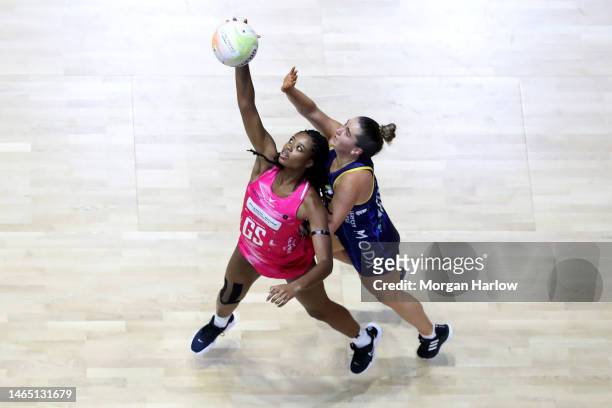 Olivia Tchine of London Pulse competes for the ball with Michelle Magee of Leeds Rhinos during the Netball Superleague match between Leeds Rhinos and...