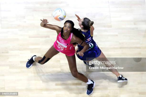 Olivia Tchine of London Pulse competes for the ball with Michelle Magee of Leeds Rhinos during the Netball Superleague match between Leeds Rhinos and...