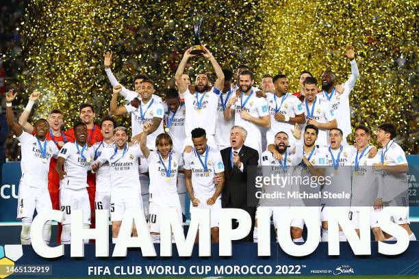 Karim Benzema of Real Madrid lifts the FIFA Club World Cup Morocco 2022 Trophy following their sides victory in the FIFA Club World Cup Morocco 2022...