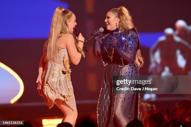 Becky Hill and Ella Henderson perform on stage during The BRIT Awards 2023 at The O2 Arena on February 11, 2023 in London, England.