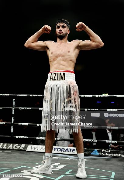 Azim W Adam Azim celebrates victory after the Super Lightweight fight... News ...