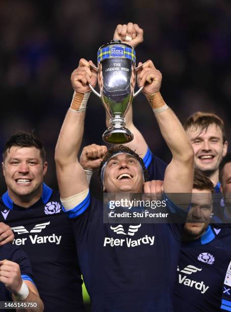 Scotland captain Jamie Ritchie holds aloft the Doddie Weir Trophy after their 35-7 victory over Wales after the Six Nations Rugby match between...