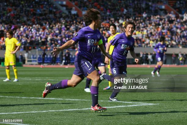 Hisato Sato of Sanfrecce Hiroshima celebrates after scoring the team's first goal during the Fuji Xerox Super Cup between Sanfrecce Hiroshima and...