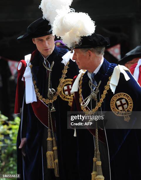 Britain's Prince William and Prince Charles, Prince of Wales take part in the procession to St George's Chapel for the annual service of the Order of...