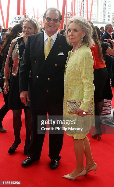 Roger Moore and Kristina Tholstrup attend the 'Electric Burma' concert for Aung San Suu Kyi at the Bord Gais Energy Theatre on June 18, 2012 in...