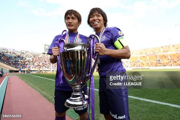 Toshihiro Aoyama and Hisato Sato of Sanfrecce Hiroshima pose with the trophy after the Fuji Xerox Super Cup between Sanfrecce Hiroshima and Kashiwa...