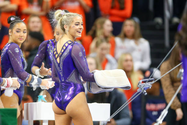 Olivia Dunne of LSU warms up on the uneven bars during a gymnastics meet against Auburn at Neville Arena on February 10, 2023 in Auburn, Alabama.