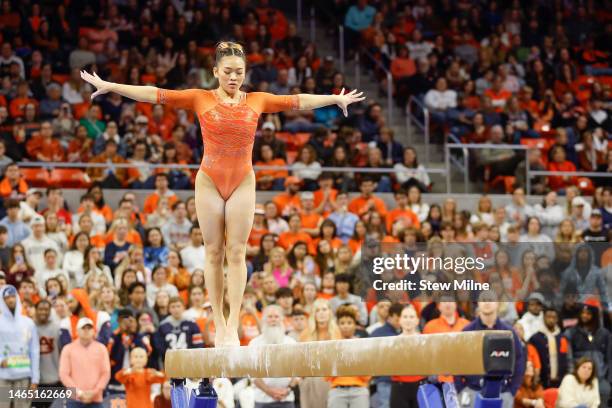 Sunisa Lee of Auburn competes on the balance beam during a meet against LSU at Neville Arena on February 10, 2023 in Auburn, Alabama.