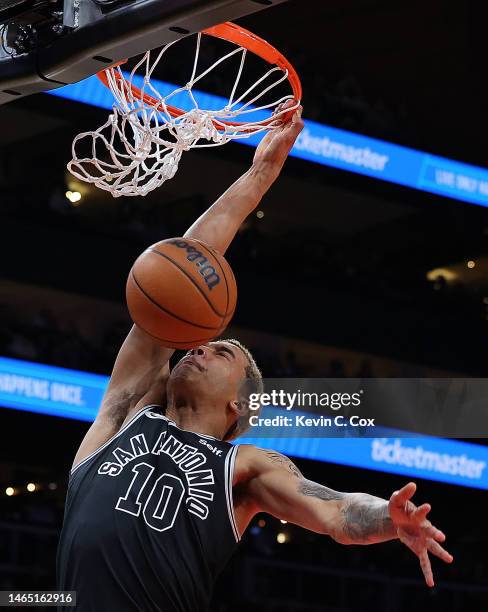 Jeremy Sochan of the San Antonio Spurs dunks against the Atlanta Hawks during the first quarter at State Farm Arena on February 11, 2023 in Atlanta,...