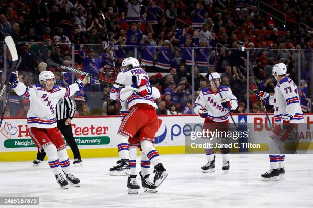 The New York Rangers celebrate the second goal scored by Artemi Panarin during the third period of the game against the Carolina Hurricanes at PNC...