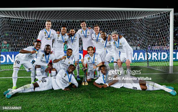 Players of Real Madrid celebrate with the trophy after winning the FIFA Club World Cup Morocco 2022 Final match between TBC v TBC at Prince Moulay...