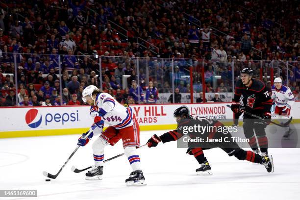 Artemi Panarin of the New York Rangers shots and scores a goal during the third period of the game to complete the hat trick against the Carolina...