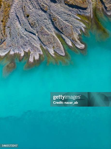 close up of abstract blue water. - lake pukaki stock pictures, royalty-free photos & images